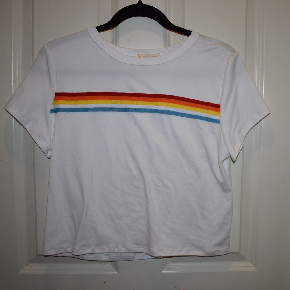White shirt with rainbow on front